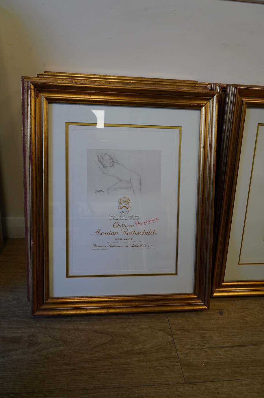 A set of fifteen Mouton Rothschild vintage wine label prints, framed, each 35 x 26cm. Condition - good